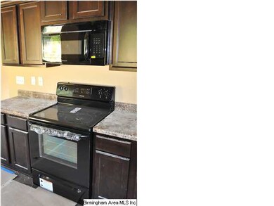 Smooth top stove and microwave included.