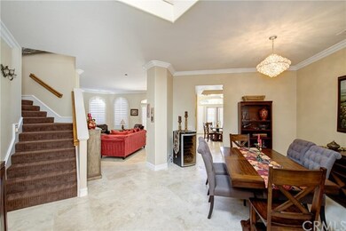 Formal open entry with stone flooring and a separa