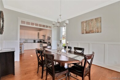 Gorgeous formal dining room with transoms, looking
