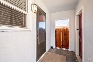 Entry to Kitchen and Attached Shed