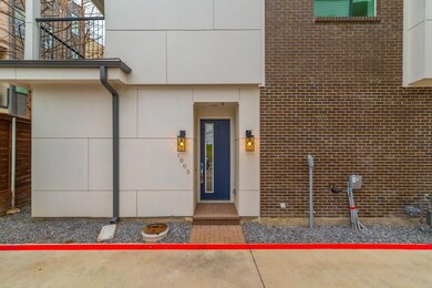 Doorway to property with a balcony