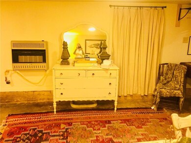 The apartment is heated by a fabulous gas heater that makes the apartment cozy in winter and cooled by two heat/cool window units in the summer.
