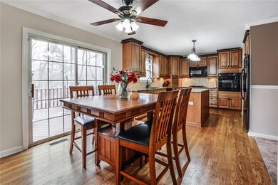 Spacious kitchen with eat in area opens to deck for easy outdoor dining!