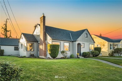 Unobstructed Mt. Rainier views from upper bedroom and front yard.