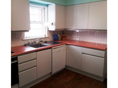 Kitchen. Bright kitchen with laminate floor and ce