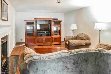 The living room has hardwood floors.