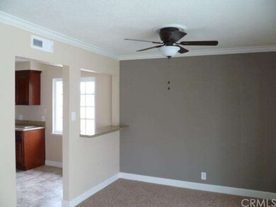DINING AREA WITH BAR TO KITCHEN BREAKFAST AREA