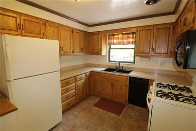 The updated kitchen has plenty of cabinetry and in