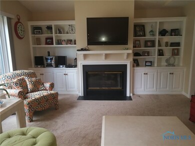Living room with gas fireplace.
