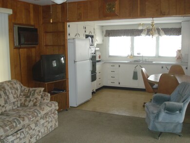 Livingroom looking into kitchen