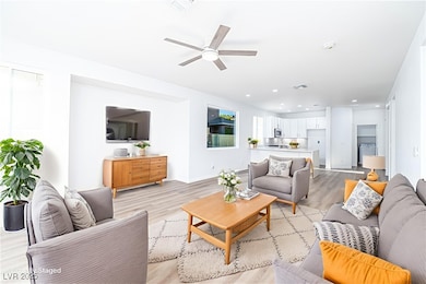 Living room featuring light wood finished floors,