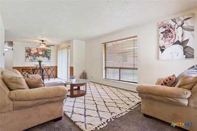 Quaint dining space looks onto the side yard.