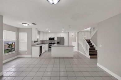 view of family room & breakfast nook