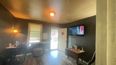 Entrance foyer featuring wood finished floors