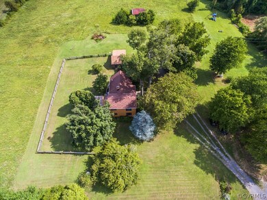 CEDAR SIDING ON A 2 STORY HOUSE THAT SITS ON 2 ACRES. WOODED LOT ALLOWS PRIVACY. DETACHED GARAGE WITH ATTACHED WORKSHOP, DETACHED SHED, LANDSCAPED, FENCED IN BACKYARD