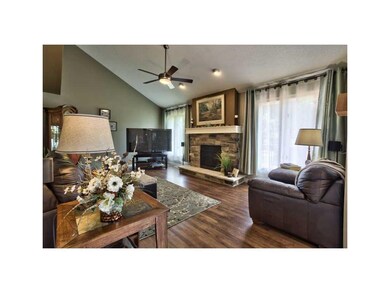 Living Room. VAULTED CEILINGS, GAS FIREPLACE WITH 
