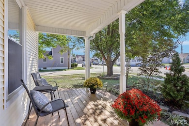 Porch featuring a residential view