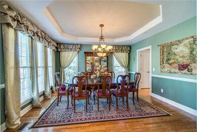 The spacious dining room features tons of natural light and beautiful trey ceiling.  Your guests will love being dined in this room.