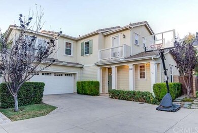 Exterior entrance with 2 car attached garage.  The