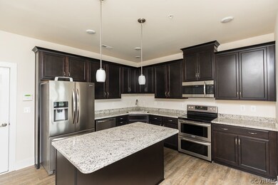 KITCHEN W/ GRANITE, SS APPLIANCES, PENDANT LIGHTS,