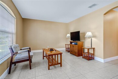 Living room with hallway leading to bedrooms