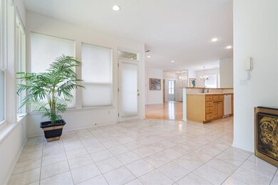Sunroom off kitchen and living room