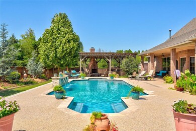 View of swimming pool with a pergola, ceiling fan,