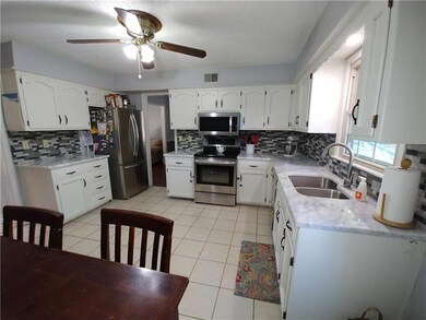 Large updated kitchen with lots of cabinets and SS