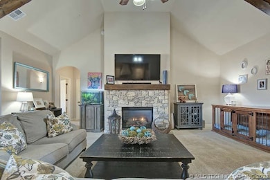 Large living area with gas burning fireplace.