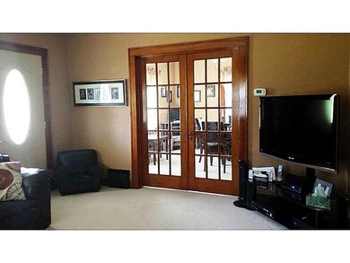 Living Room. Beautiful French Doors to Dining Room