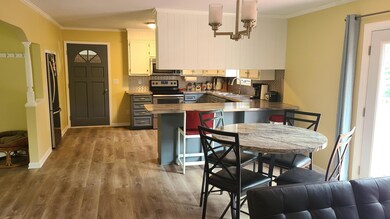 3 Open Kitchen & Dining Area
