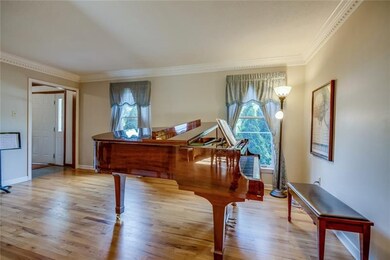 Open Living Room with hardwood floors.