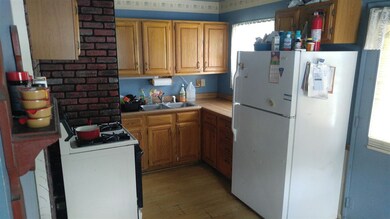 Kitchen also features a pantry.  Range, Refrigerat