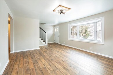 Living room with charming bayed window