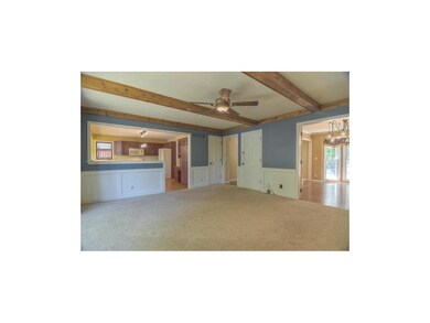 Family room leads to kitchen & formal living room