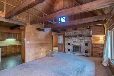 Beautiful wood beams in the living room with tall 