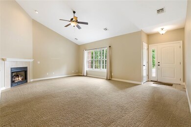 Discover the living room upon entering the home.