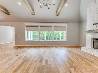Sunny great room style living room with 16' ceilin