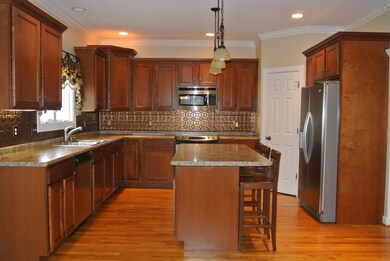 ....A CLOSER VIEW OF THE KITCHEN W/ ALL APPLIANCES...