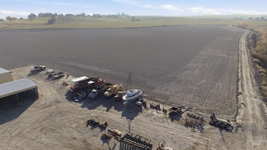 Overview of rural landscape featuring extensive farmland