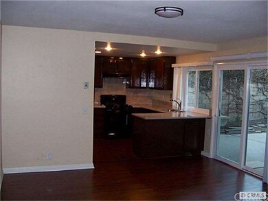 Kitchen opens to great Family Room with sliding do