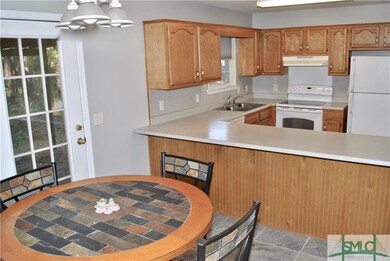Kitchen Bar and a Separate Cooking Area Provides P