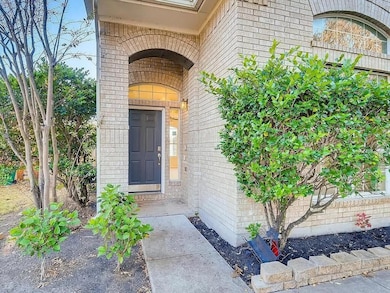 Property entrance with brick siding