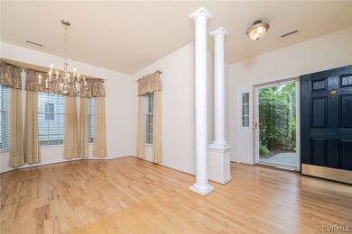 Foyer entrance featuring light hardwood / wood-sty