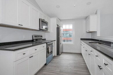 135 Chelmsford St unit 1, Lowell, MA 01851 - photo 4