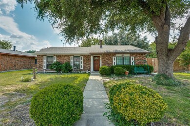 Single story home featuring a front yard