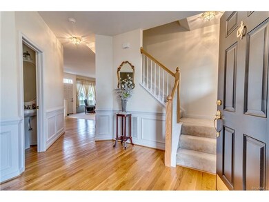 Open foyer connecting to the Living room, 1/2 bath