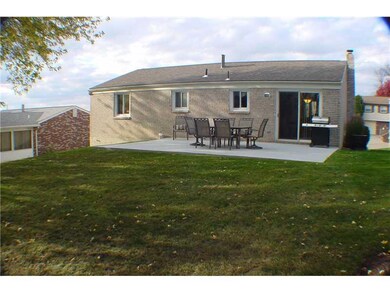 Exterior Back. Back Patio with Doors to Kitchen