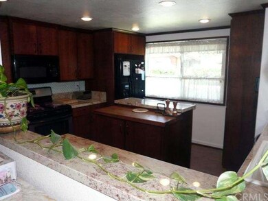 Kitchen with center island and grante counters