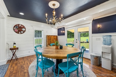 Centrally located between the kitchen and living r
